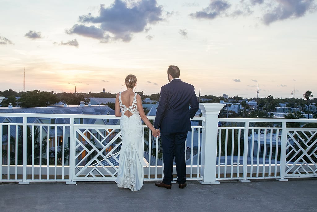 a couple enjoys their wedding day.