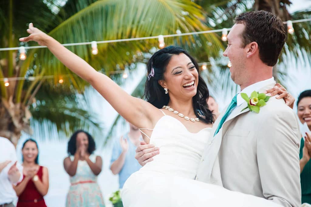 Couple dancing their first dance at an outside Key West Reception