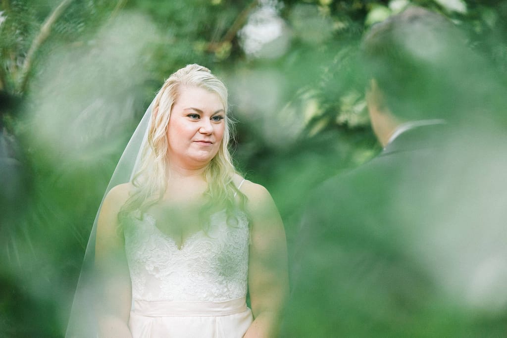 A Key West bride smiles happily knowing her emergency wedding day kit is there if she needs it.