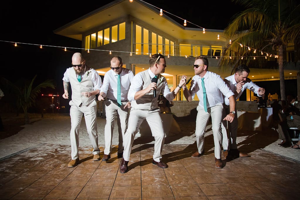 A couple dances at a Key West wedding reception on the beach.