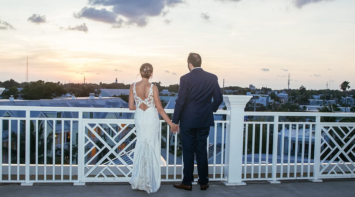 a couple enjoys their wedding day.